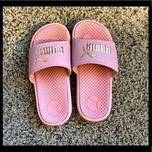 Girls size 2 PUMA slides.